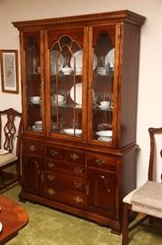 China cabinet in dining room.