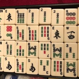 Portable Mahjong in a case http://www.ctonlineauctions.com/detail.asp?id=729004