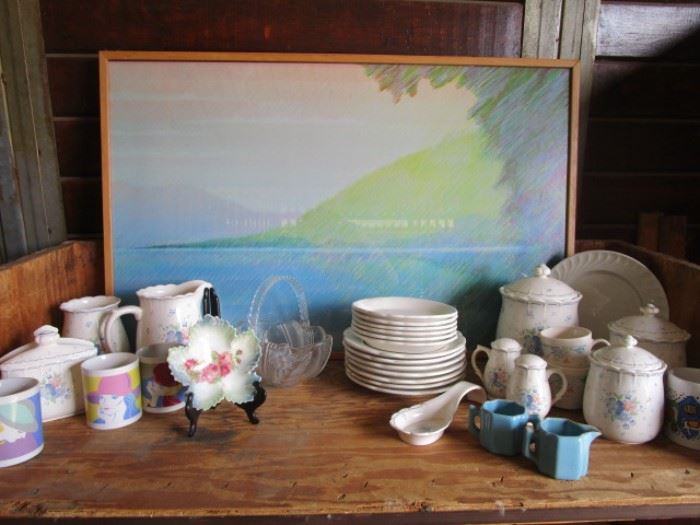 Collection of ceramic and pottery dishware with an amazing original piece of art done in chalk