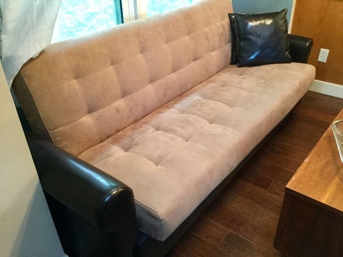 Clean and practical, this futon is a great piece for any extra space. You move! 