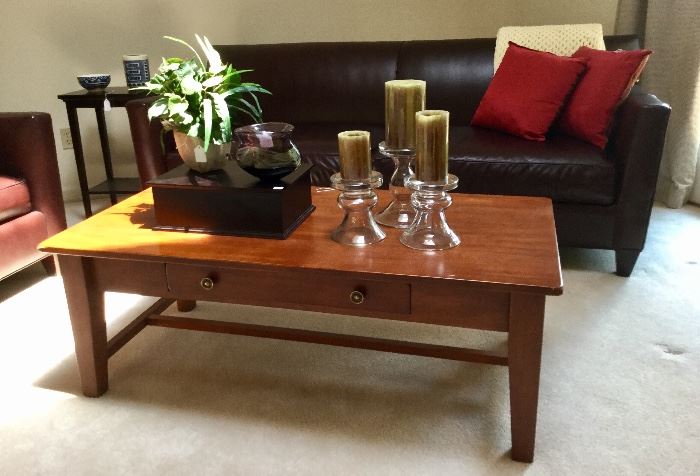 Sofas and chairs by Crate & Barrel. Solid wood coffee table. 