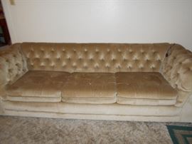 Tufted beige sofa