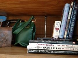 Books on antiques and a Rosenfeld Original green leather handbag