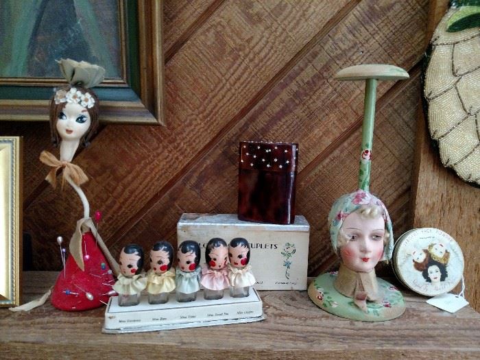 Vintage perfumes, pin cushion doll and hat stand