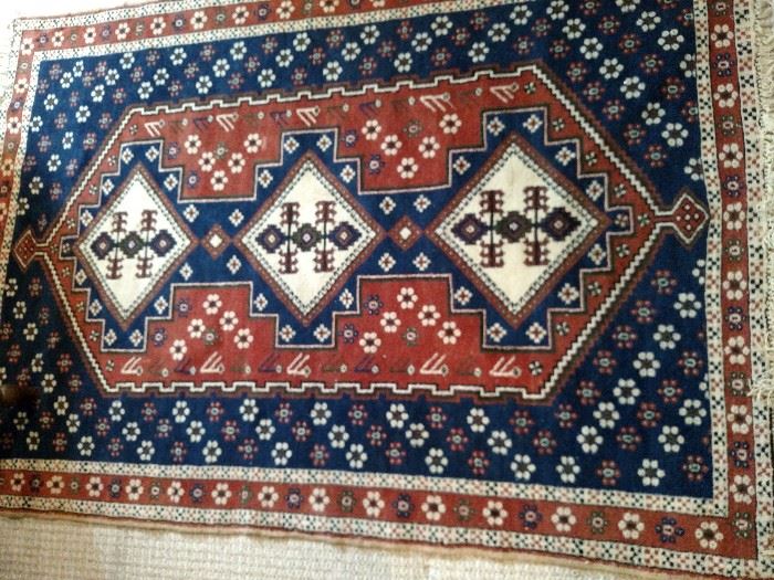 Handmade Oriental area rug