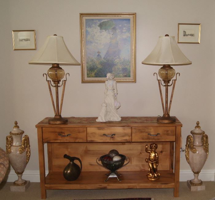 Lamps, sofa table and decor.