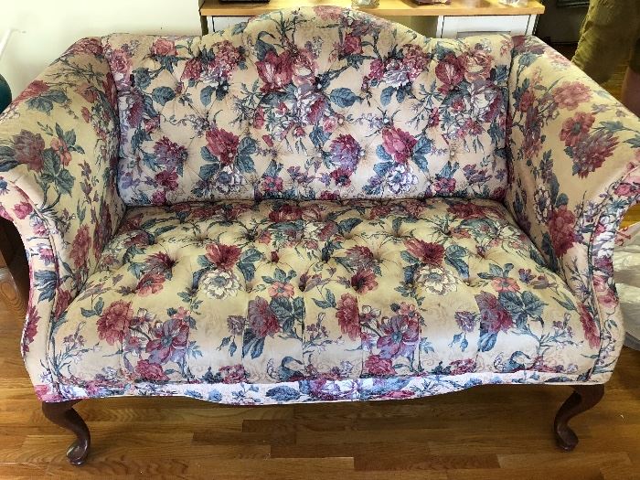 Tufted chippendale style love seat