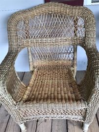 Wicker outdoor furniture, matching bench, two chairs and table