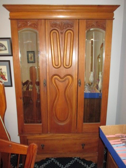 Beautiful antique wardrobe with clothes bar