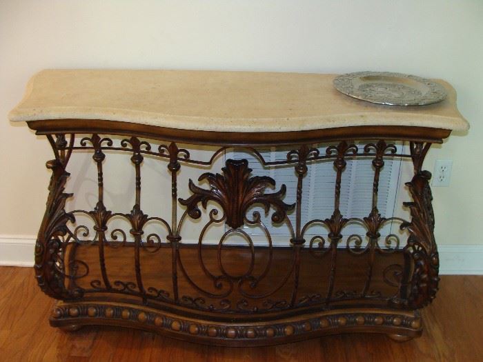Wrought iron table with simulated marble top