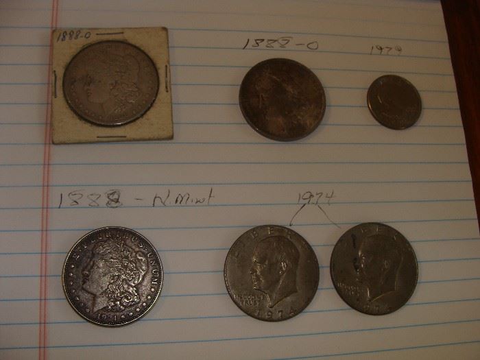 2 1888 mint o Morgan Dollars, 1, 1888 no mint mark Morgan dollar, 2 1974 Eisenhower dollars, 1 1979 dollar