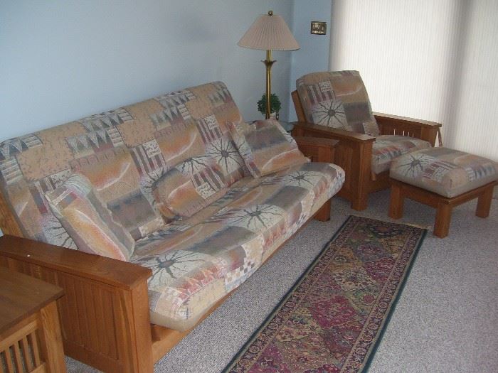 Futon couch and matching chair and end table.