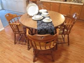 Colonial-style Dining/Dinette Table with 1-Leaf. Arm Chairs (4) sold separately