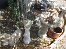 More Bird Baths and I think I see a Weber Grill in the background
