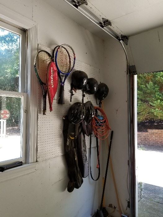 Tennis rackets and bike helmets miscellaneous sports equipment
