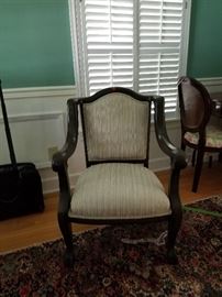 1 of 2 upholstered chairs (rug not included In the sale).