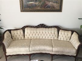 Fantastic Kimball  French Provincial sofa in perfect condition with fabulous carvings and button tufted upholstery.
