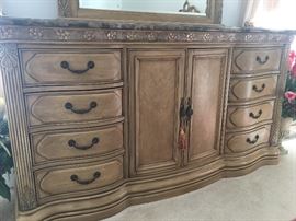 A closeup of the fine detailing of the dresser