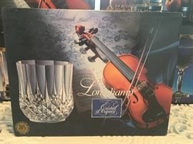 Many sets of brand new in the box Longchamp Cristal