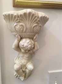Very nice cherub wall shelves