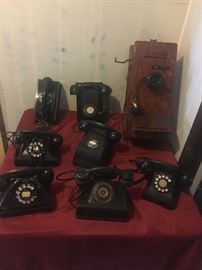 Vintage telephones, including crank wall phone
