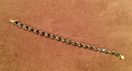 14kt yellow gold and sapphire bracelet. 