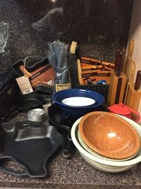 Cast iron cookware, some new, Texasware Confetti bowls. 
