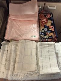 Lovely selection of table linens and napkins, some unused, all laundered and pressed. 