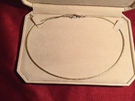 14kt  necklace, reversible, white gold on one side and yellow gold on the other. 