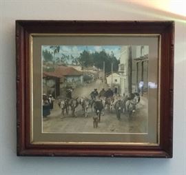 Framed cattle drive image.