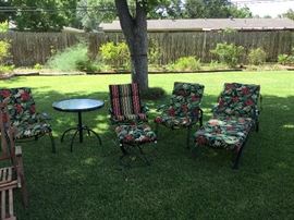 Beautiful patio set with new, unused pads. Table extends up/down. 2 chairs, swivel rocker & ottoman, chaise. 