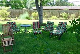 Beautiful patio set with new, unused pads. Table extends up/down. 2 chairs, swivel rocker & ottoman, chaise. 