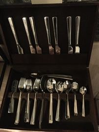 Mid Century Ginko Burton stainless steel service for six with extras.