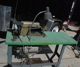 Industrial sewing machine. This was maintained like the proud owner of a Cadillac. We drained the coolant to move it from San Gabriel. Tested prior to move.