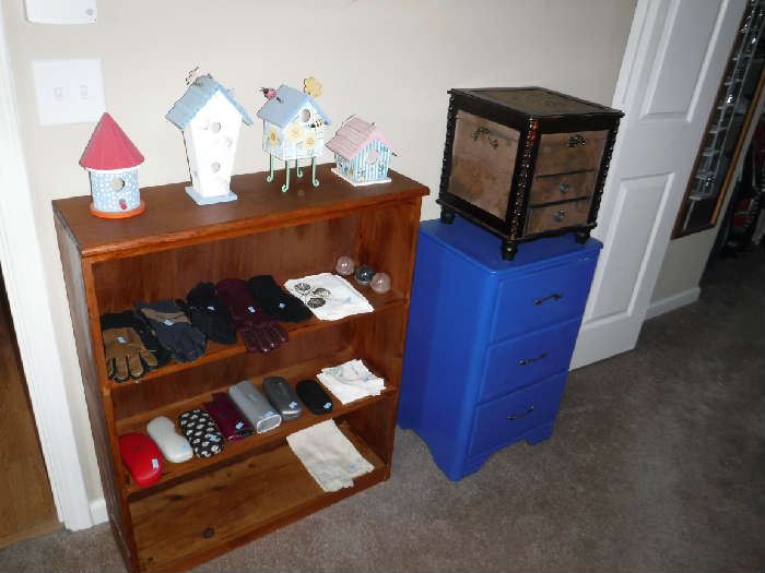 Smaller jewelry chest on top of blue 3 drawer tower