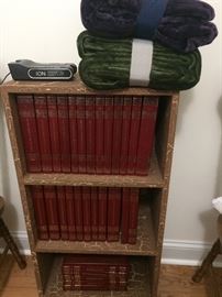 Small Bookcase, New Blankets, Encyclopedias