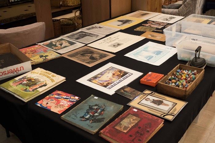 So many vintage prints and books!  Also pictured is a wooden box of vintage marbles.  We will be taking bids on them.  There are some OLD ONES.