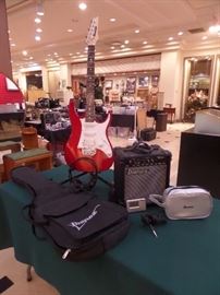 Ibanez electric guitar, amp, gig bag, tuner, chord, strap, stand, picks - complete outfit.