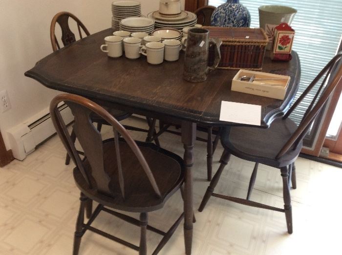 Antique oak game table with matching chairs