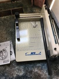 Arts and crafts materials and scrapbooking equipment including brand new "The Cinch" binding machine by We R Memory Keepers and large guillotine paper cutter.