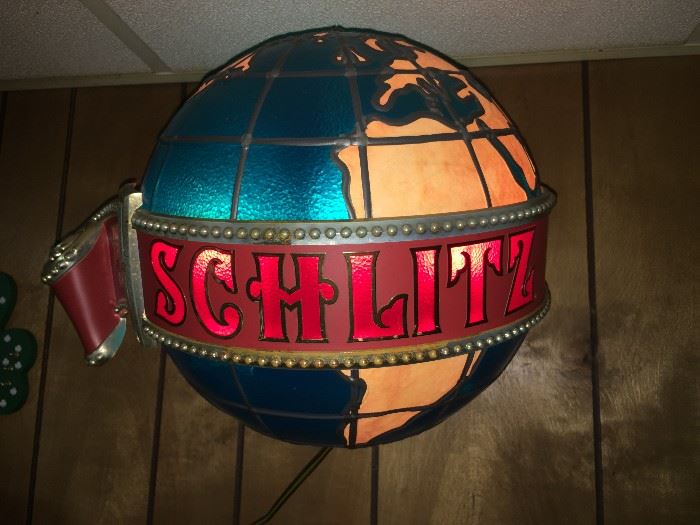 Working vintage 3-dimensional Schlitz beer globe / neon  sign. Other working neon signs include Coors and Stroh Light (pictured) plus lots of other collectible barware not shown. 