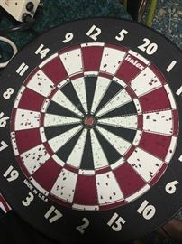 Dart board, includes darts (not pictured).