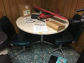 Remote control model airplane. Fun vintage furniture. 