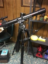 Newer Bushnell telescope with tripod.