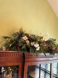 greenery top of china cabinet