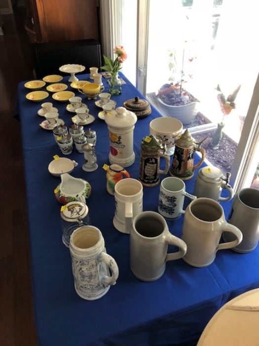 Large collections of steins, bone china and crystal.