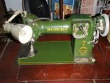 Bernina Sewing Machine in cabinet w chair.