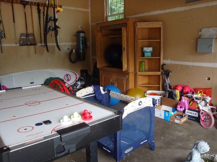 Air Hockey Table, Portable Crib, Life Jackets, Swim toys and goggles, armoir