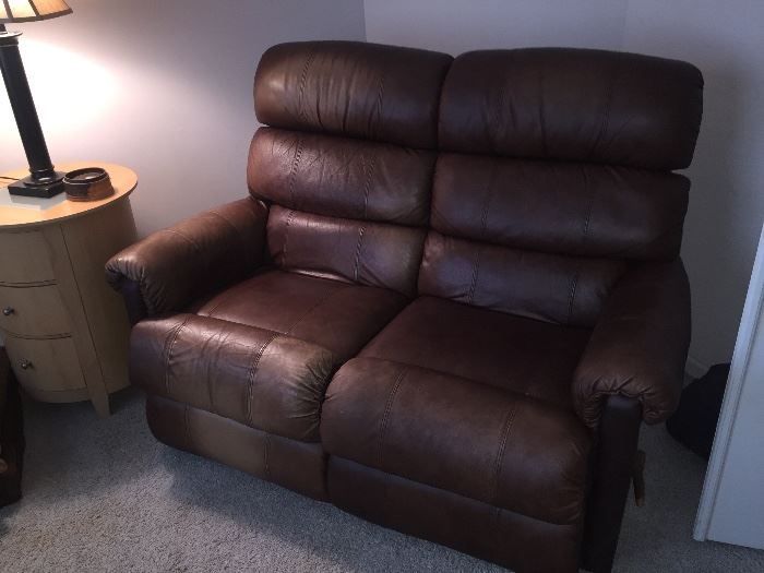 Leather reclining love seat.  