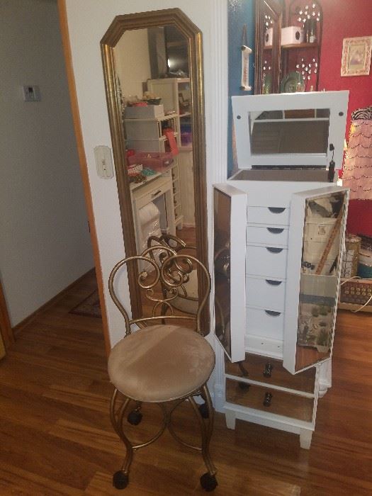 Mirrored jewelry cabinet and vanity stool on wheels